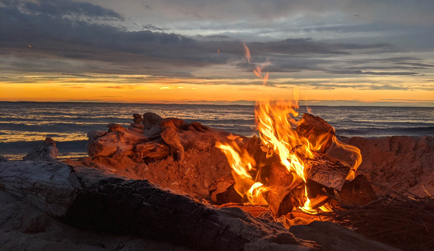 Sleeping Bear Dunes Michigan- fire at night on the beach.